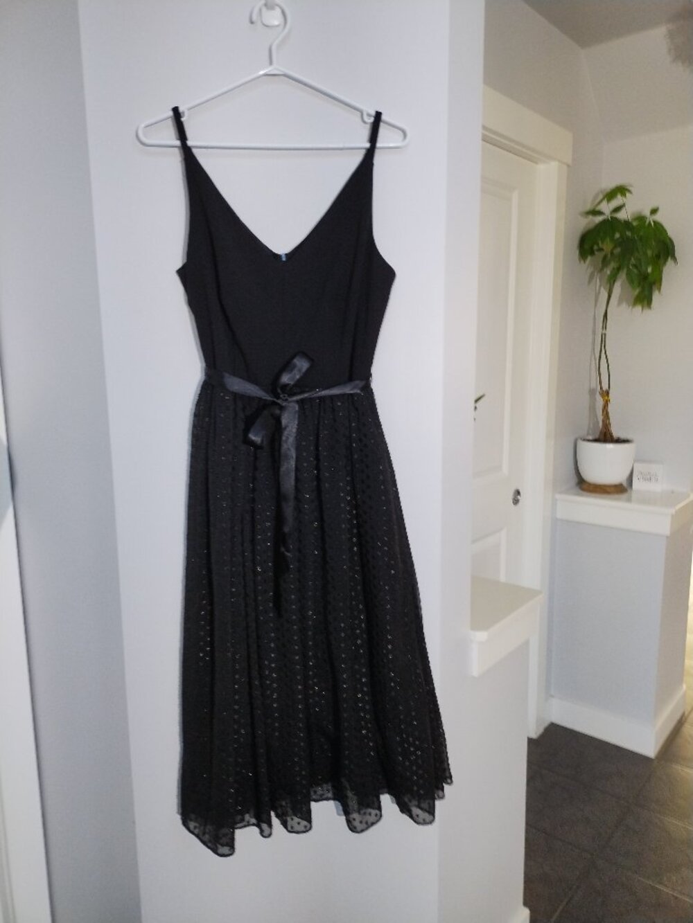 Fun dress with sparkly polka dots on the skirt with ribbon belt